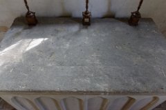 Chickney - St Mary - Mensa  The altar slab, or mensa, found buried in the churchyard 300 years after it was hidden there during the Reformation. The five crosses etched into the surface represent the 5 wounds of Christ on the cross. : Chickney, St Mary, Church, Essex, Altar, Mensa