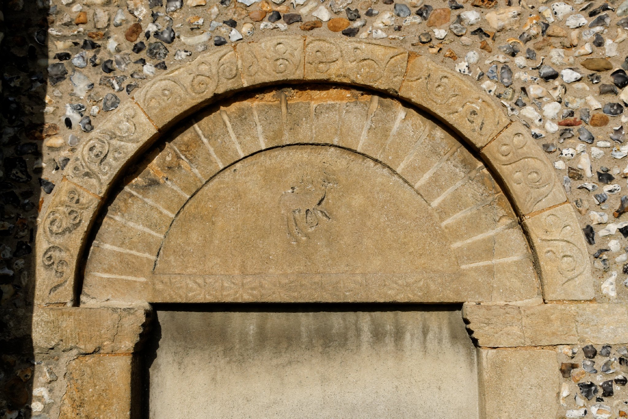 Birchanger - St Mary - Norman door with lamb