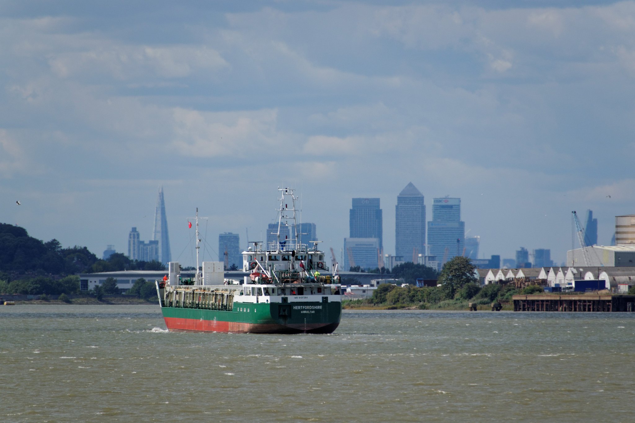 The Thames, with the Shard and Canary Wharf in the background.